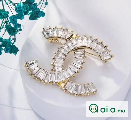 Une Selection de luxe de Broche Chanel Inoxydable