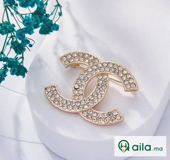 Une Selection de luxe de Broche Chanel Inoxydable
