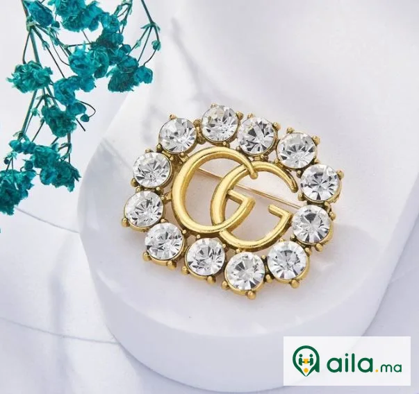 Broche Gucci Inoxydable